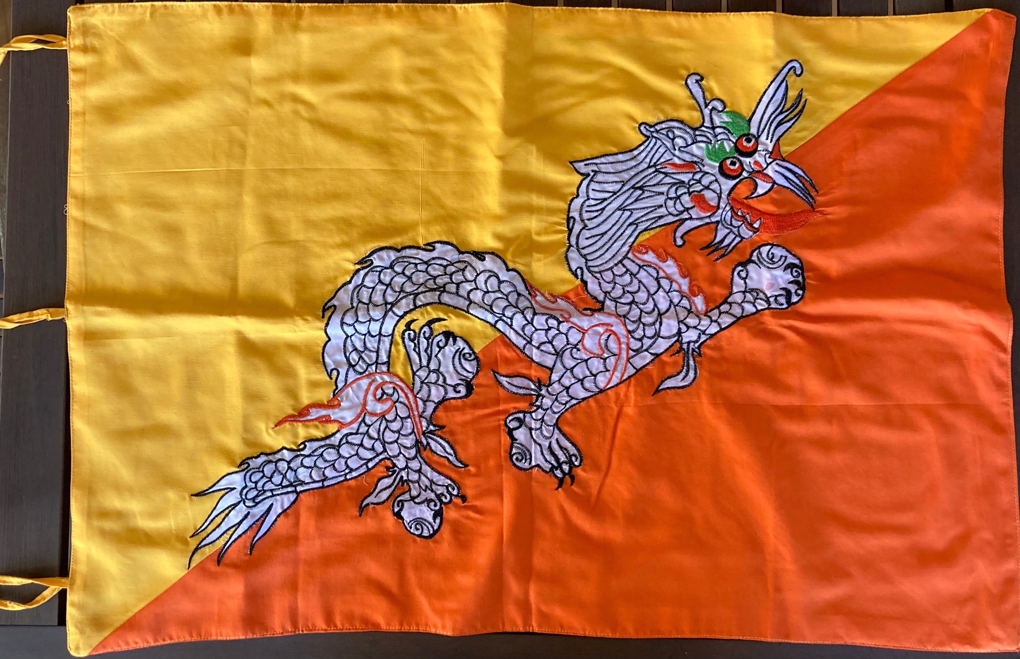 The National Flag of Bhutan - handmade with embroidered dragon